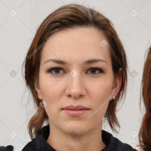 Neutral white young-adult female with medium  brown hair and brown eyes