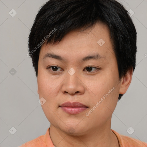 Joyful asian young-adult male with short  brown hair and brown eyes