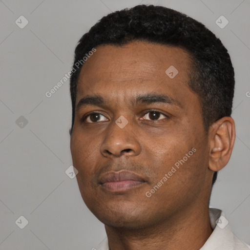 Neutral black young-adult male with short  black hair and brown eyes