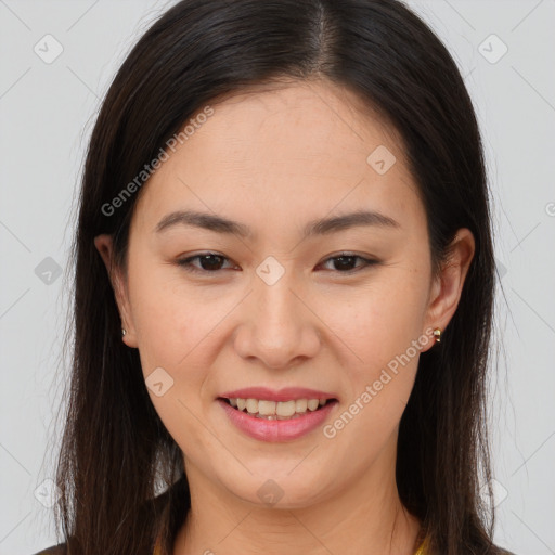 Joyful white young-adult female with long  brown hair and brown eyes