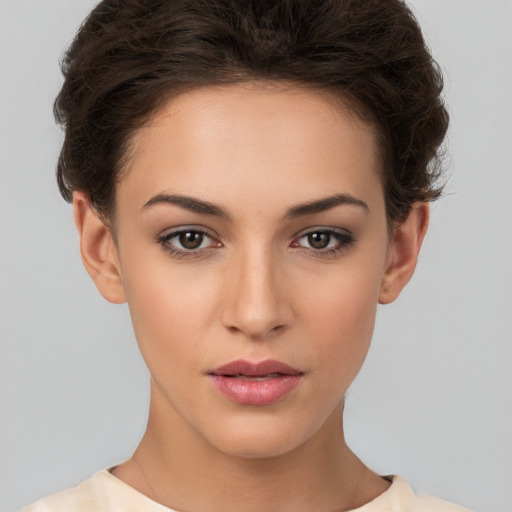 Neutral white young-adult female with short  brown hair and brown eyes