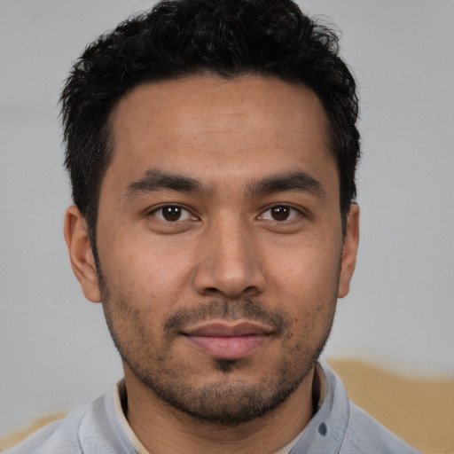 Neutral asian young-adult male with short  brown hair and brown eyes