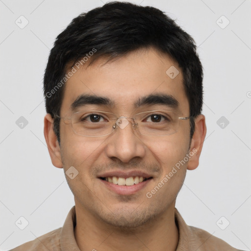 Joyful latino young-adult male with short  black hair and brown eyes