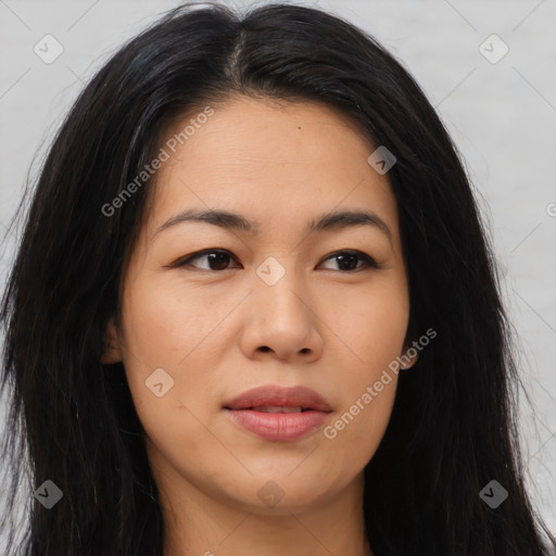 Joyful asian young-adult female with long  brown hair and brown eyes