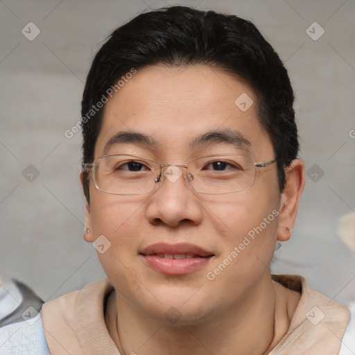 Joyful asian young-adult male with short  brown hair and brown eyes