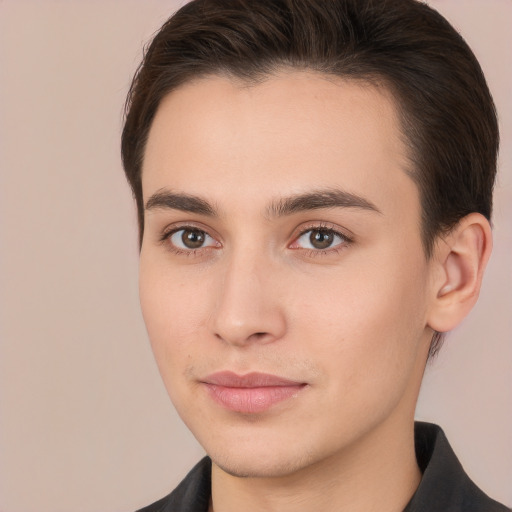 Joyful white young-adult male with medium  brown hair and brown eyes