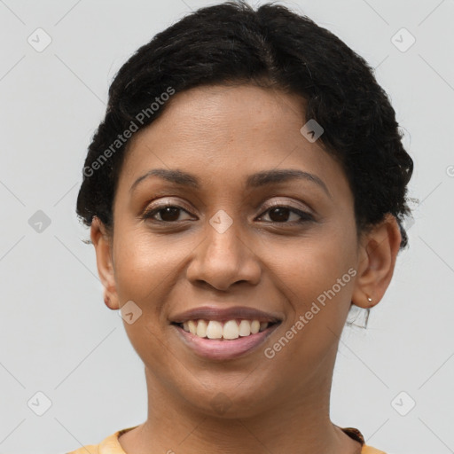 Joyful latino young-adult female with short  brown hair and brown eyes