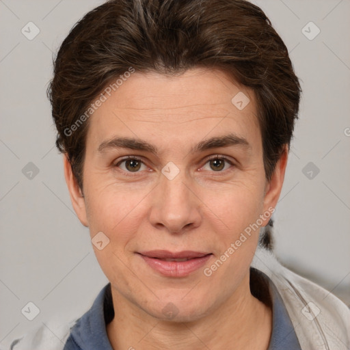 Joyful white adult female with short  brown hair and brown eyes