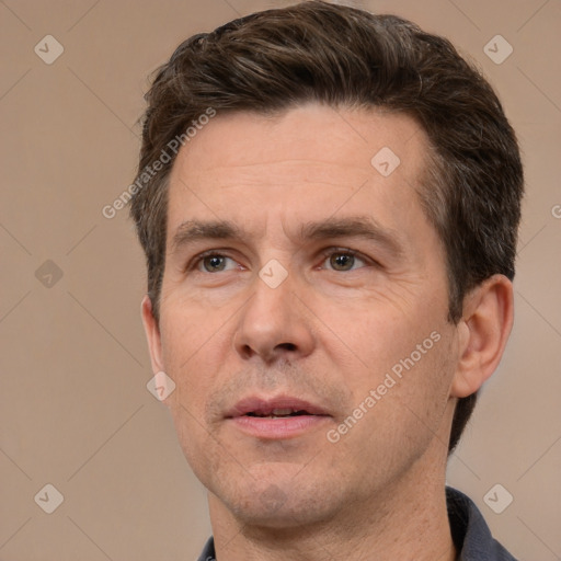 Neutral white adult male with short  brown hair and brown eyes