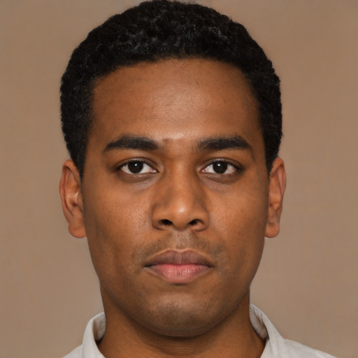 Neutral latino young-adult male with short  brown hair and brown eyes