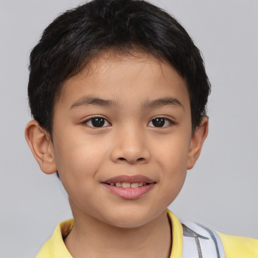 Joyful asian child female with short  brown hair and brown eyes