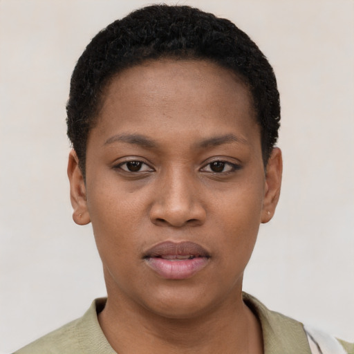 Joyful black young-adult female with short  black hair and brown eyes