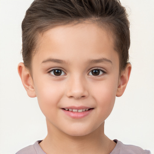 Joyful white child female with short  brown hair and brown eyes