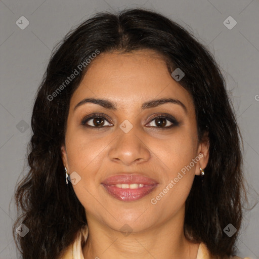 Joyful black young-adult female with medium  brown hair and brown eyes