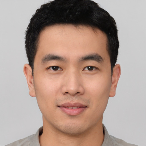 Neutral asian young-adult male with short  black hair and brown eyes