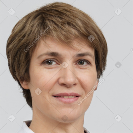 Joyful white adult female with short  brown hair and brown eyes