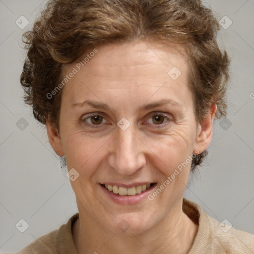 Joyful white adult female with short  brown hair and brown eyes