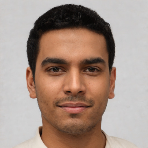 Neutral latino young-adult male with short  black hair and brown eyes