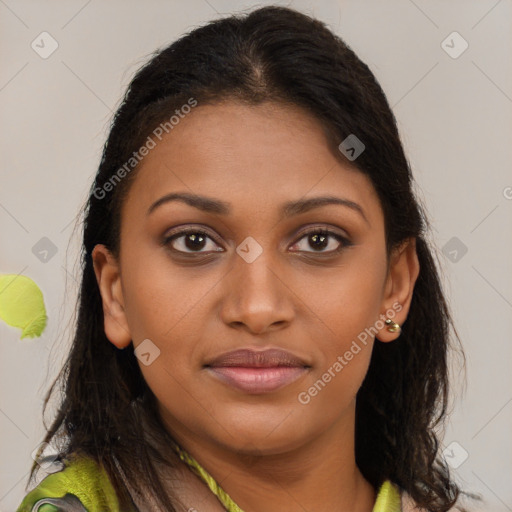 Joyful latino young-adult female with long  brown hair and brown eyes