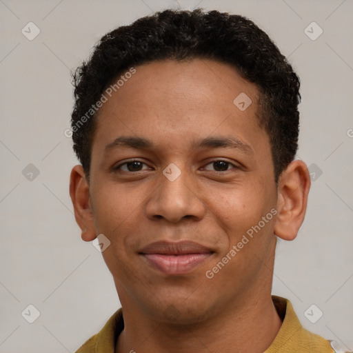 Joyful black young-adult male with short  brown hair and brown eyes