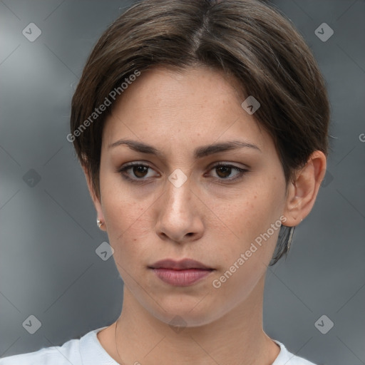 Neutral white young-adult female with short  brown hair and brown eyes