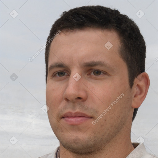 Neutral white young-adult male with short  brown hair and brown eyes