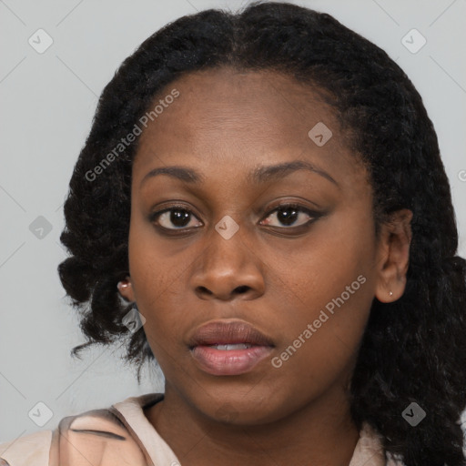 Neutral black young-adult female with medium  black hair and brown eyes