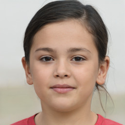 Joyful white child female with short  brown hair and brown eyes