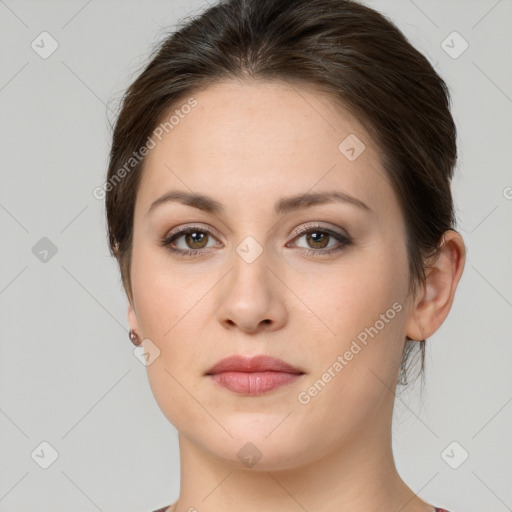 Neutral white young-adult female with medium  brown hair and brown eyes