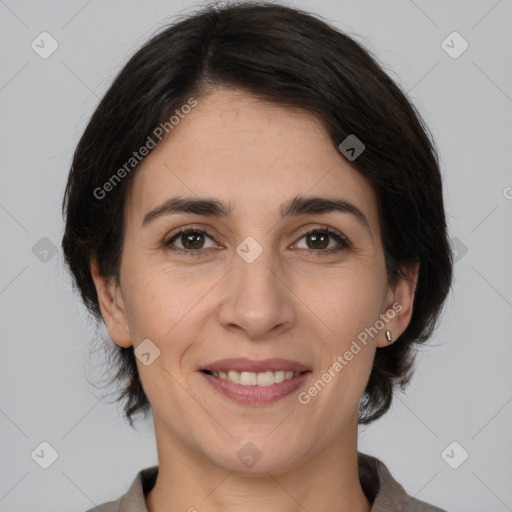 Joyful white adult female with medium  brown hair and brown eyes