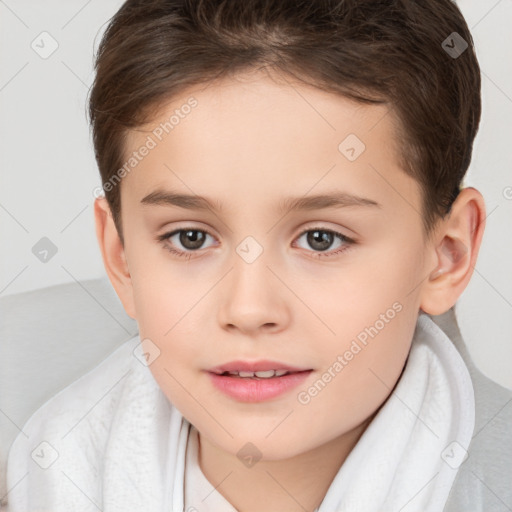 Joyful white child female with short  brown hair and brown eyes