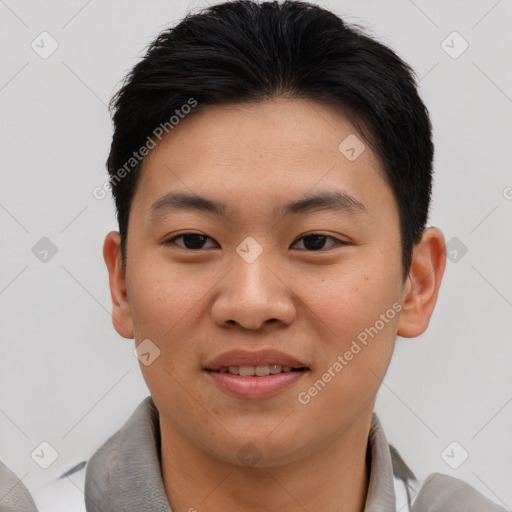 Joyful asian young-adult male with short  brown hair and brown eyes