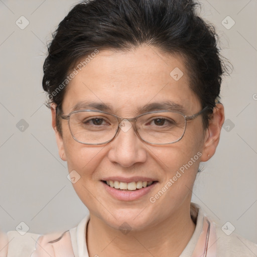 Joyful white adult female with short  brown hair and brown eyes