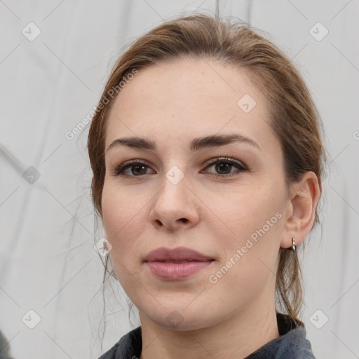 Neutral white young-adult female with medium  brown hair and grey eyes