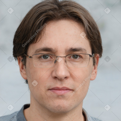 Joyful white adult male with short  brown hair and grey eyes