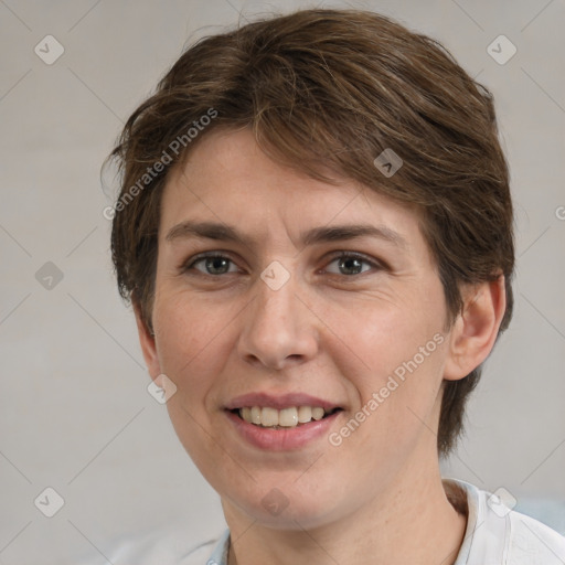 Joyful white adult female with medium  brown hair and brown eyes