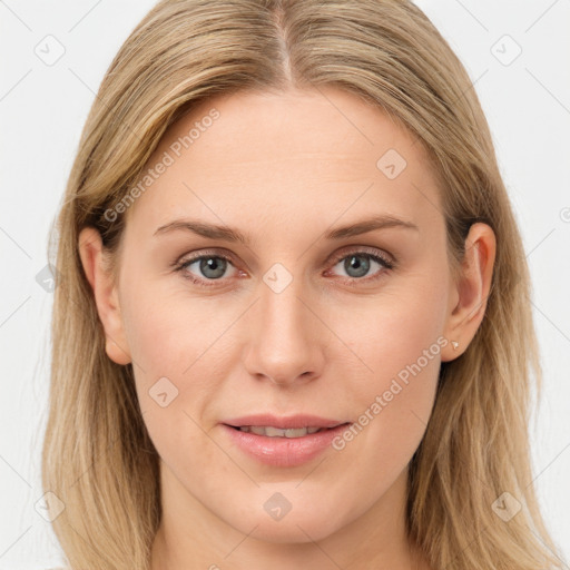 Joyful white young-adult female with long  brown hair and blue eyes