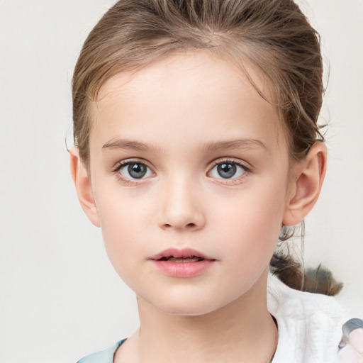 Neutral white child female with short  brown hair and brown eyes