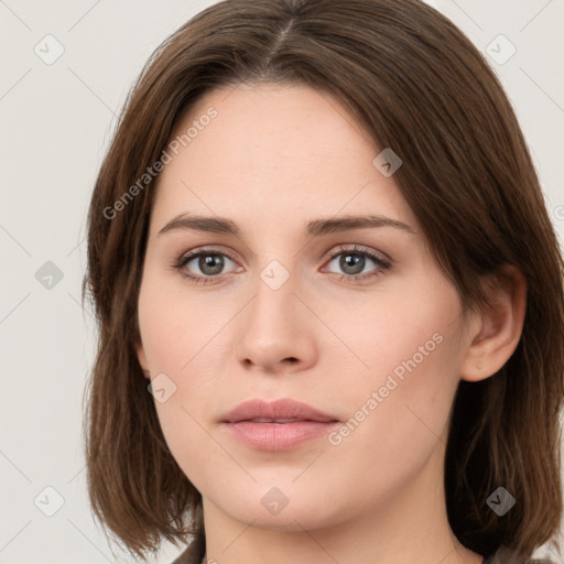 Neutral white young-adult female with medium  brown hair and grey eyes