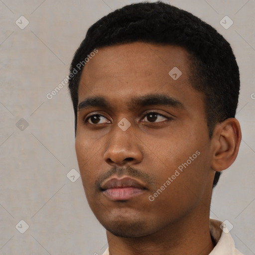 Neutral black young-adult male with short  black hair and brown eyes