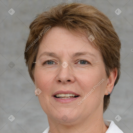 Joyful white adult female with short  brown hair and grey eyes