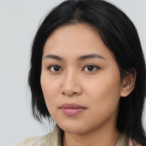 Neutral latino young-adult female with medium  black hair and brown eyes