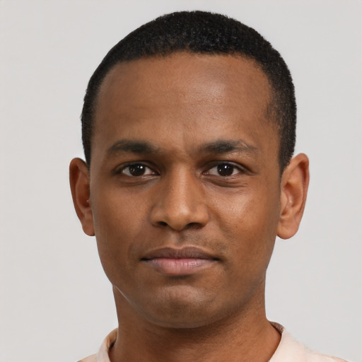 Neutral black young-adult male with short  black hair and brown eyes