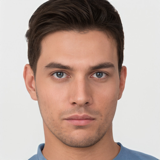 Neutral white young-adult male with short  brown hair and brown eyes