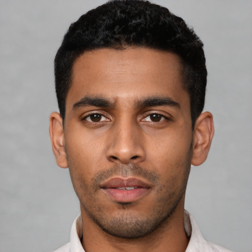 Neutral latino young-adult male with short  black hair and brown eyes
