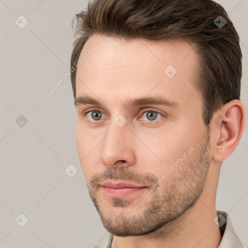 Neutral white young-adult male with short  brown hair and brown eyes