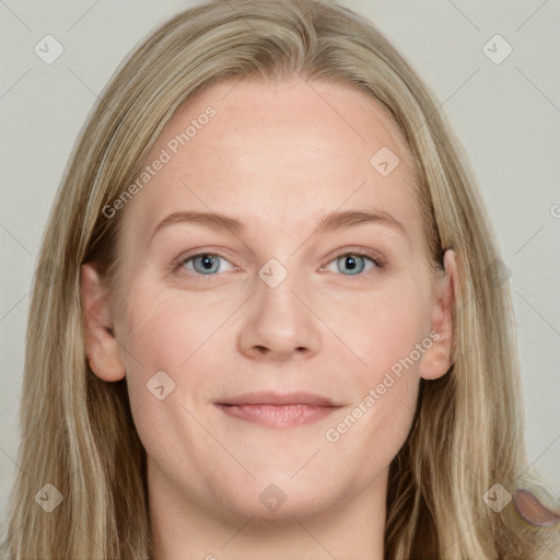 Joyful white young-adult female with long  brown hair and blue eyes