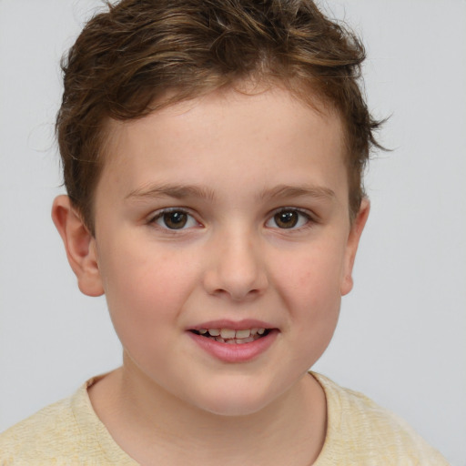 Joyful white child female with short  brown hair and brown eyes