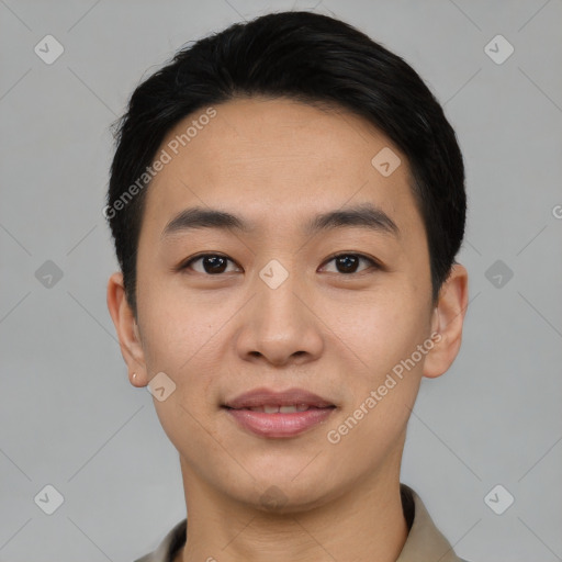 Joyful asian young-adult male with short  black hair and brown eyes