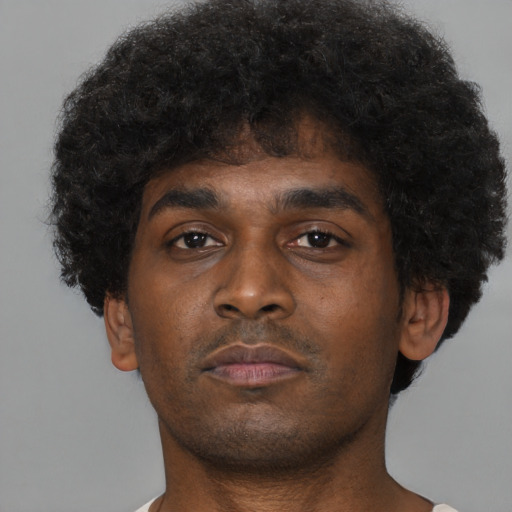 Neutral black young-adult male with short  brown hair and brown eyes